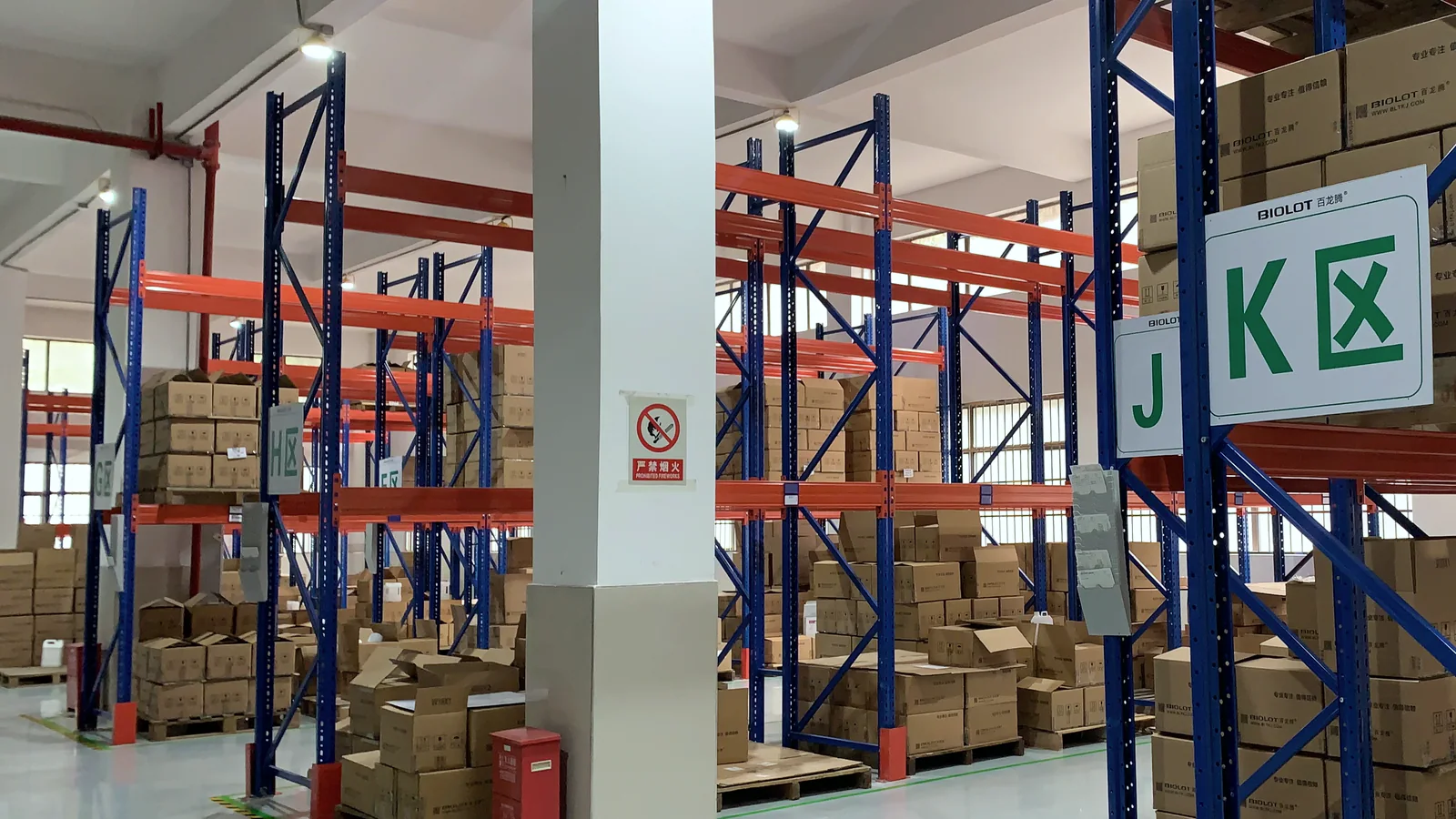 BIOLOT product cartons stored on warehouse racking at the Wuhan operation